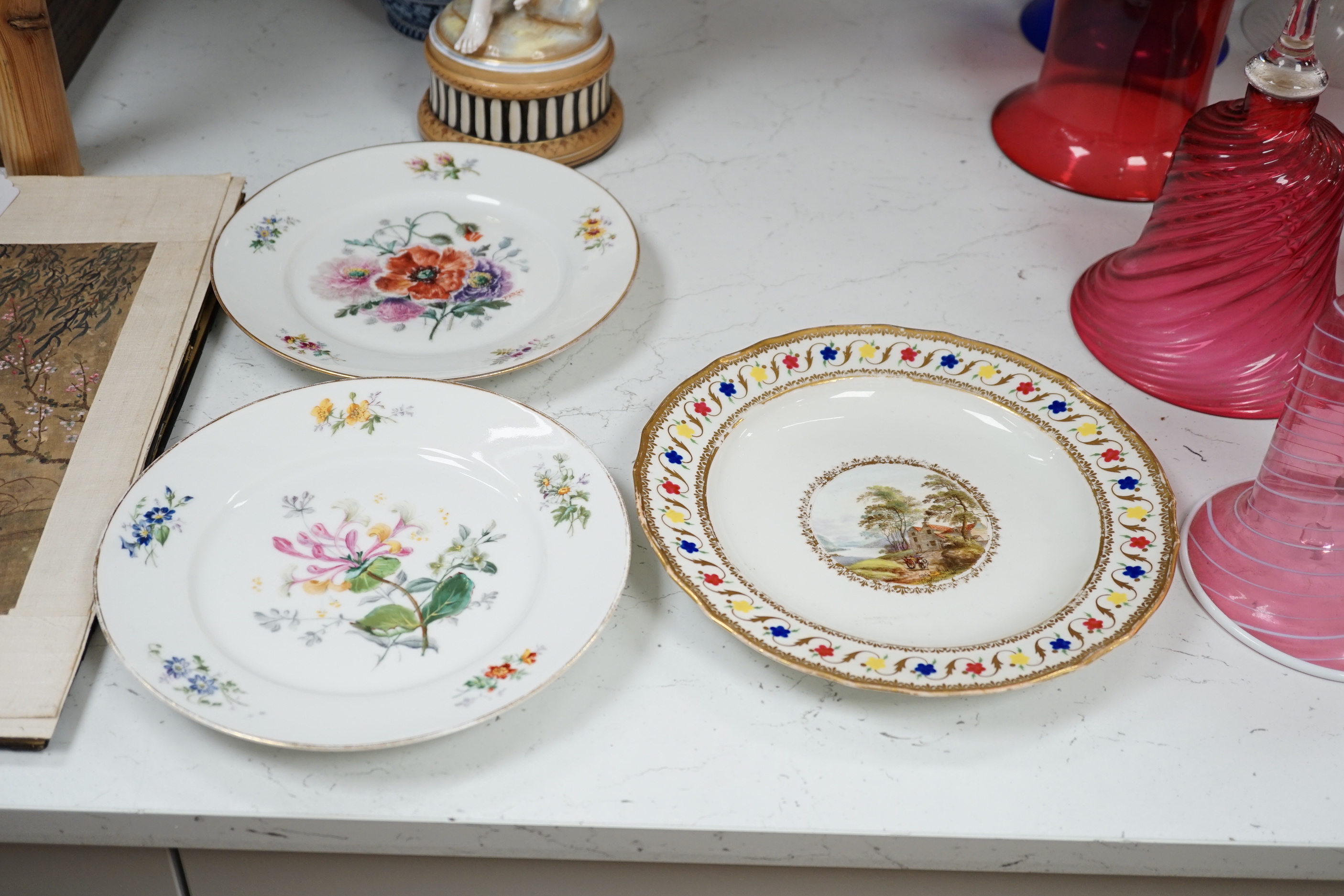 Eight porcelain items; a late 18th century Derby plate with painted scene of Coniston Lake, Lancashire, two floral painted Paris porcelain plates, a pair of Booths blue and white vases, a lidded vase, a Copeland blue gro